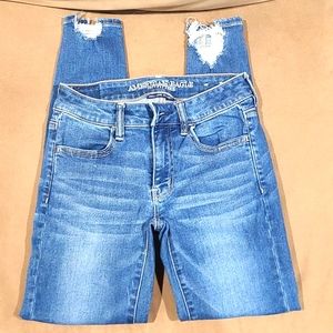 Ladies super stretch stressed denim shinny jeans.